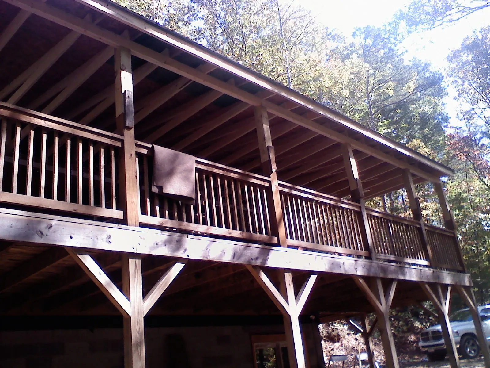 Timber framing under a new elevated porch and deck — Roof Leak Repair in North Versailles by Roofing Brothers